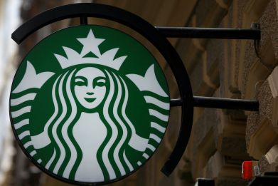 A Starbucks logo is seen at a Starbucks coffee shop in Vienna