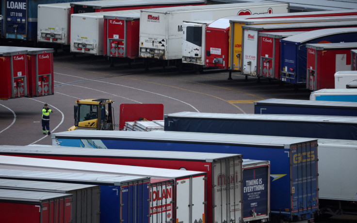 A port worker looks at lorry trailers at the port of Holyhead in Wales, Britain