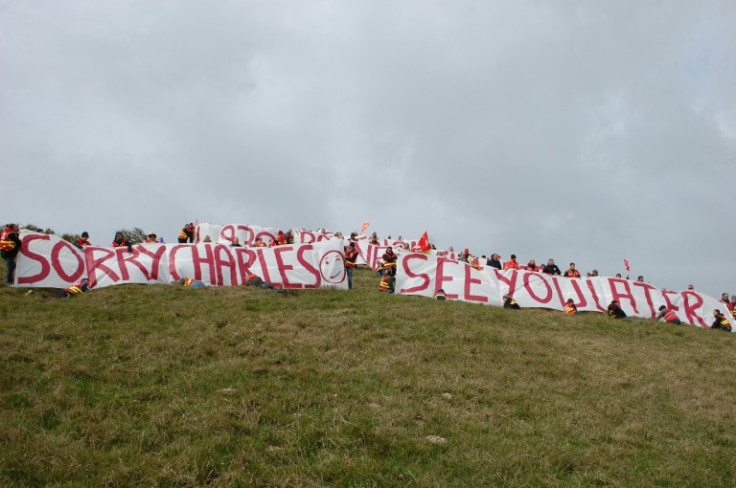 'Sorry Charles, see you later,' said the banner unfurled by union activists