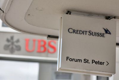 Logos of Swiss bank UBS and Credit Suisse in Zurich