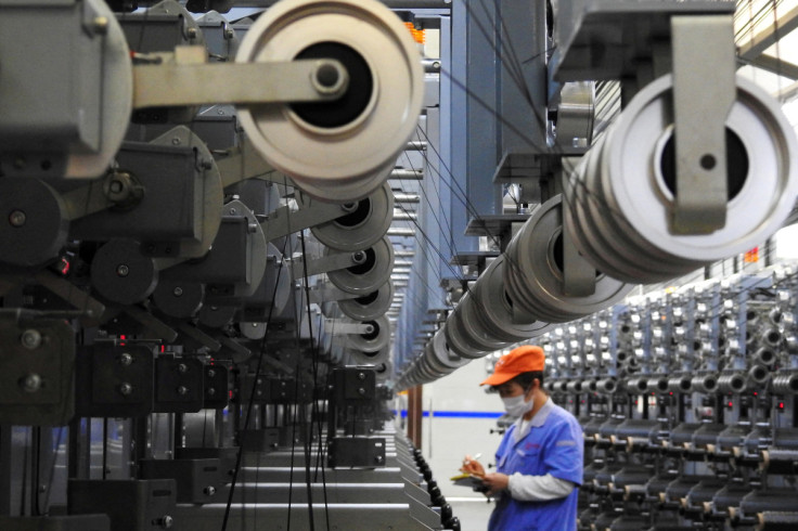 Employee works at a carbon fibre production line inside a factory in Lianyungang