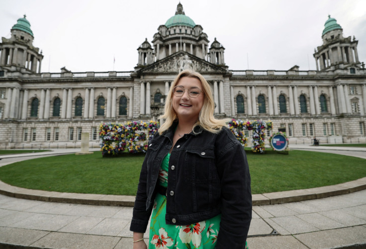 Courtney Wells poses for a picture outside Belfast City Hall