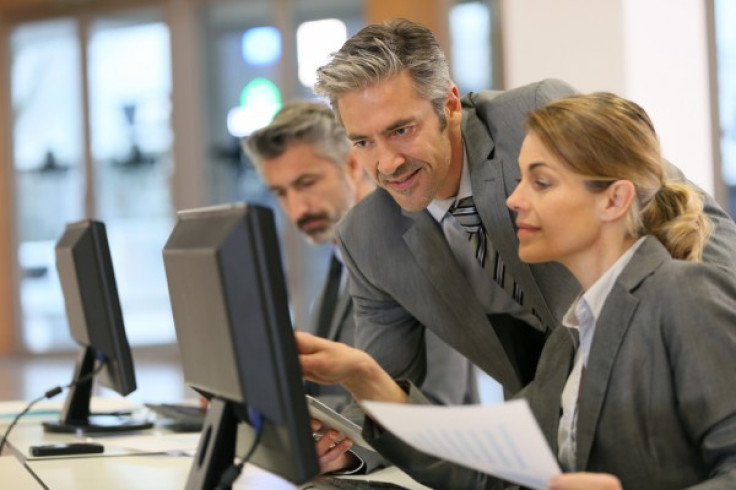 Women receiving help with her computer 