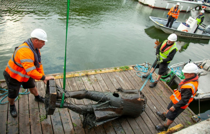 A statue of English slave trader Edward Colston, who had ties to the royal family, was toppled by protesters in 2020
