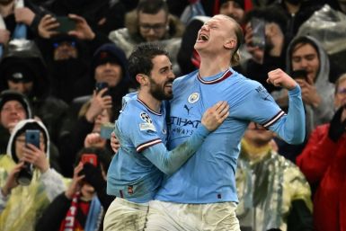 Erling Haaland (right) scored his 45th goal of the season in Manchester City's win over Bayern Munich