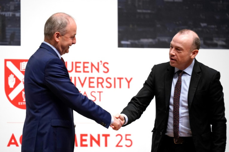 Irish foreign minister Micheal Martin (L) and Britain's Northern Ireland Secretary Chris Heaton-Harris both urged pro-UK unionists to restore the power-sharing government
