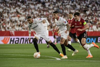 Youssef En-Nesyri (L) fires Sevilla ahead as Harry Maguire, who gave the ball away, chases in vain