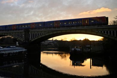 A train crosses the river Thames in London
