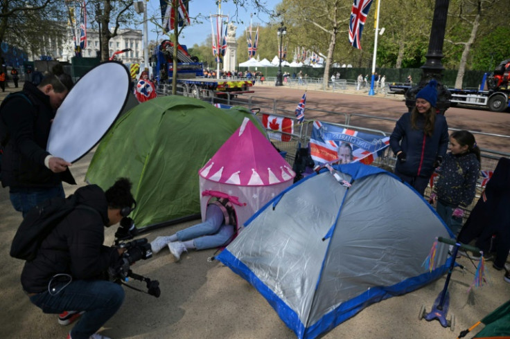 People have already begun camping out to secure a spot to see the procession, with tens of thousands more expected on Saturday