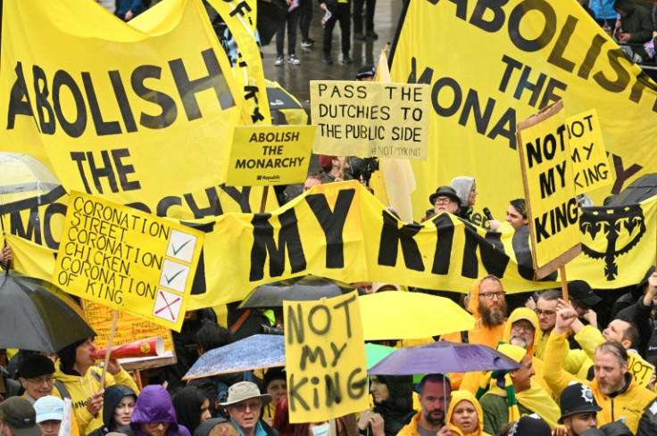 Anti-monarchy protesters held aloft placards at the coronation
