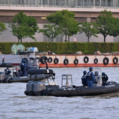 The Japan Coast Guard patrols the Shinano River that flows by venues hosting the G7 finance talks