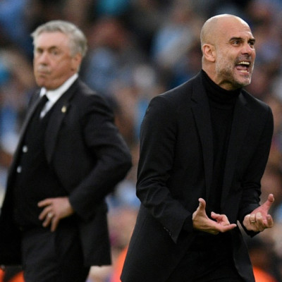 Pep Guardiola (right)  is one game away from ending Manchester City's wait to win the Champions League