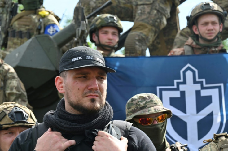 Kapustin (C) is a well-known figure in hooligan and far-right circles in Russia