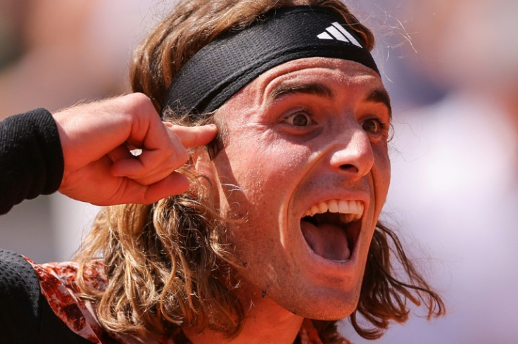 Head and heart: Stefanos Tsitsipas celebrates his win over Jiri Vesely