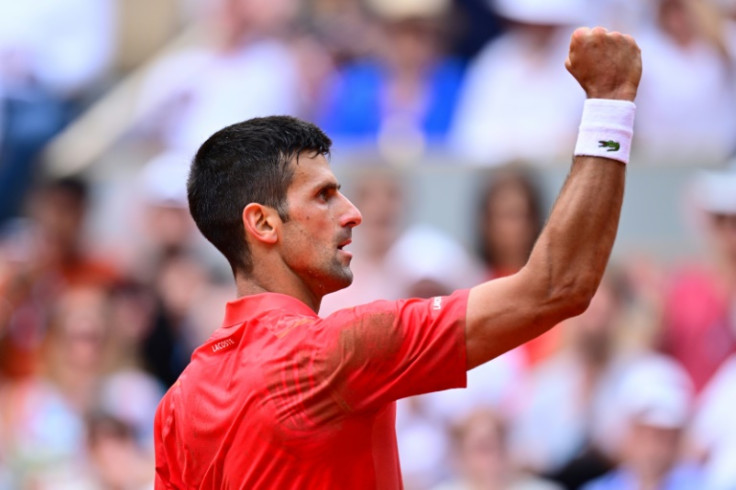 Record breaker: Novak Djokovic celebrates a point against Casper Ruud