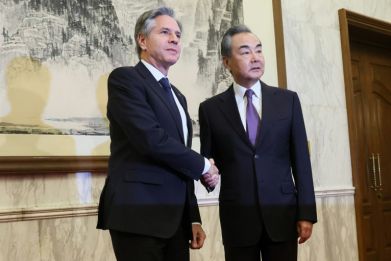 Traders were keeping tabs on talks in Beijing betwee US Secretary of State Antony Blinken (L) and China's top envoy Wang Yi as they look to ease tensions between the superpowers