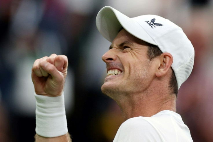 Andy Murray celebrates his win in the first round of Wimbledon