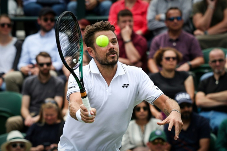 Switzerland's Stan Wawrinka set up a third-round match against Novak Djokovic at Wimbledon