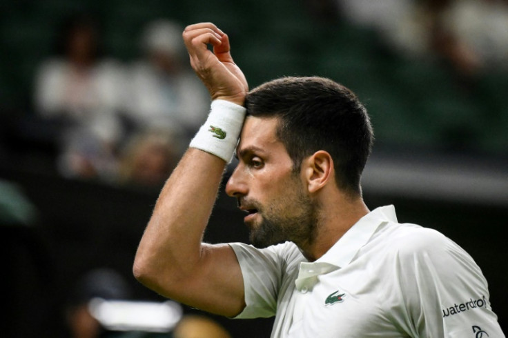 On verge of last-eight: Novak Djokovic reacts as he plays against Poland's Hubert Hurkacz