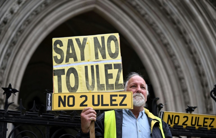 A protester against London's new Ultra Low Emission Zone (ULEZ)