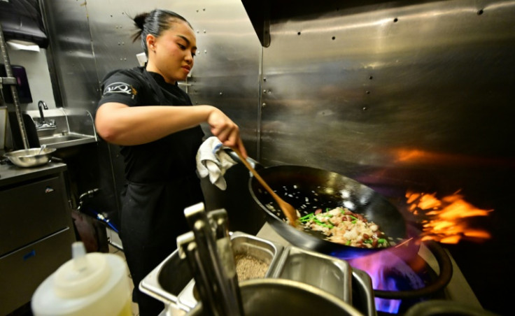 Chef Tue Nguyen cooks her Didi Fried Rice in the kitchen of her first restaurant Di Di in West Hollywood, California