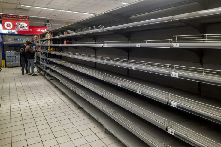 Empty shelves in a supermarket alley