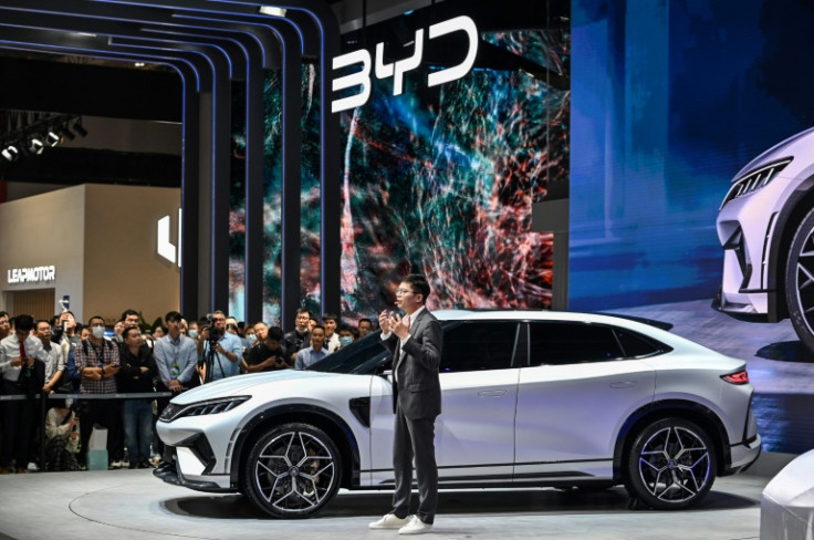 Chinese electric carmaker BYD triples half-year profit