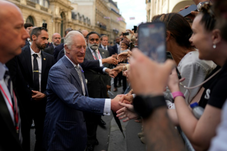 Charles took time to shake hands with well-wishers