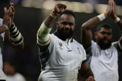 Fiji progress to the World Cup quarter-finals in spite of losing 24-23 to Portugal on Sunday