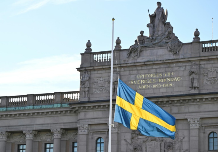 Swedish flags flew at half mast outside parliament