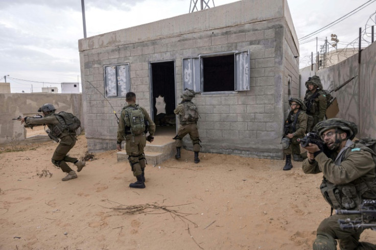 In this file picture taken on January 16, 2023, Israeli  soldiers take part in a drill at an army urban warfare training facility simulating Gaza City, at the Tze'elim training centre in the southern Negev desert