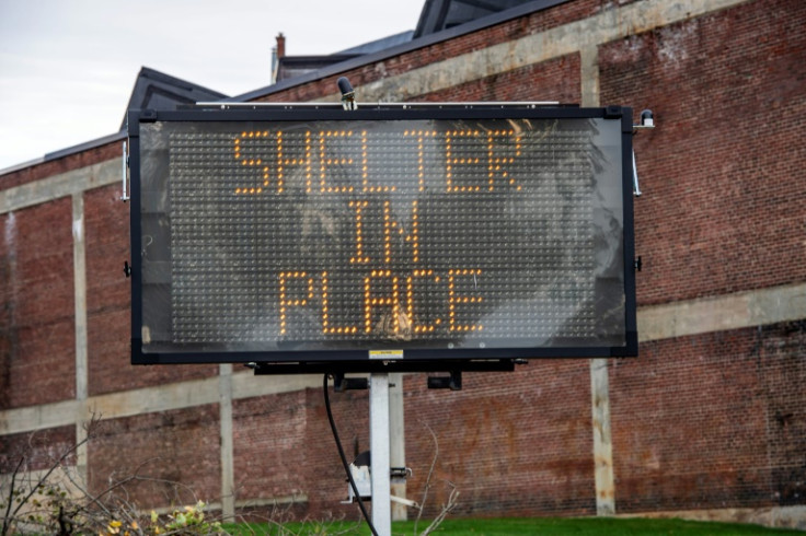 A sign calls for people to shelter in place in Lewiston, Maine on October 26, 2023 the day after a mass shooting