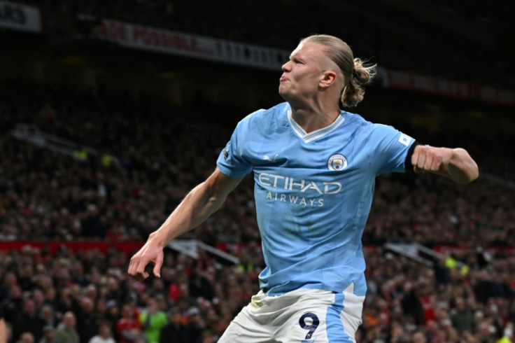 Erling Haaland celebrates his goal from the penalty spot against Manchester United