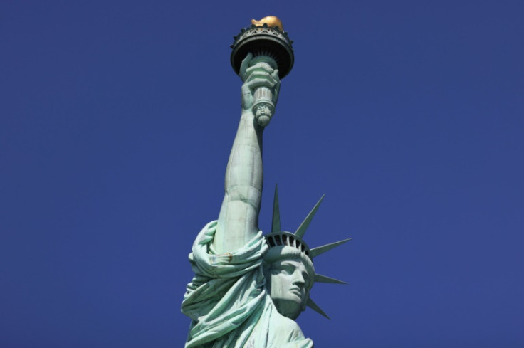 The poem from 19th-century activist and poet Emma Lazarus "New Colossus" is engraved on the base of New York's Statue of Liberty as an ode to US immigrants