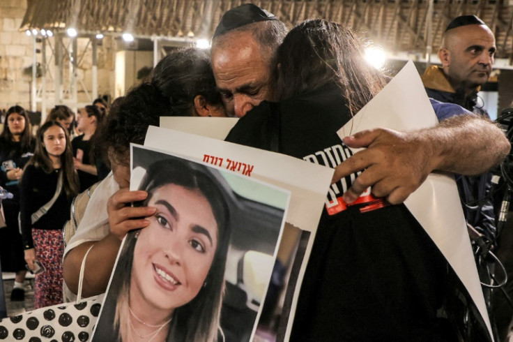 Mournful relatives of kidnapped Israelis mark one month since the October 7 Hamas attacks.