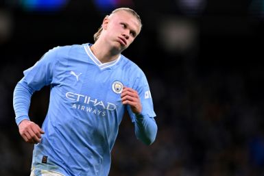 Erling Haaland scored twice as Manchester City beat Young Boys to clinch a place in the last 16 of the Champions League