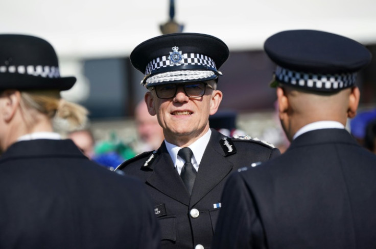 Met Police chief Mark Rowley is under pressure to ban a protest this weekend