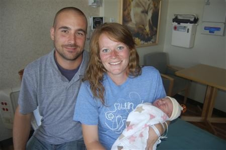 Amber Miller gave birth to her daughter June after running the Chicago Marathon.