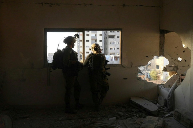 Israeli troops are pictured during operations in northern Gaza during a controlled tour