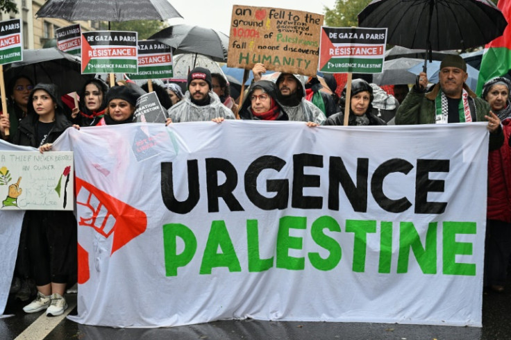 France's CGT labour union said 60,000 people marched in Paris under heavy rain