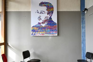 A portrait of murdered teacher Samuel Paty at the school in France where he worked