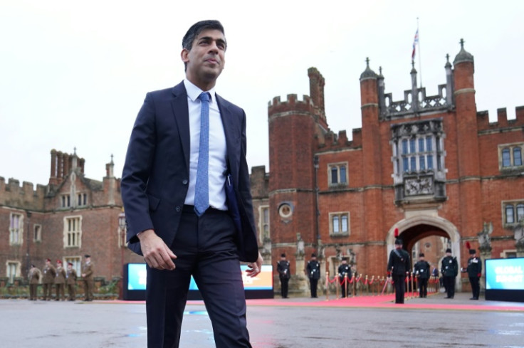 Britain's Prime Minister Rishi Sunak arrives at at Hampton Court Palace for the Global Investment Summit