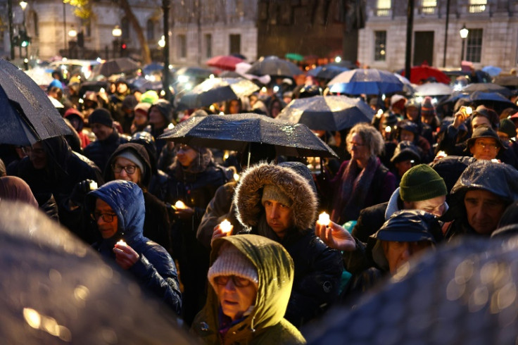 Hundreds gathered mid-afternoon in wet and frigid conditions opposite Prime Minister Rishi Sunak's Downing Street office