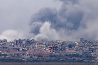 Smoke billows during Israeli bombardment on Gaza on December 7, 2023