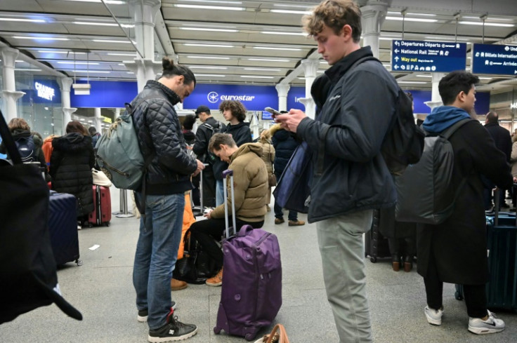 Travellers at St Pancras waited for news