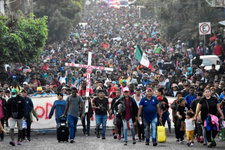 Migrants take part in a caravan towards the border with the United States in Tapachula, Chiapas State, Mexico, on December 24, 2023