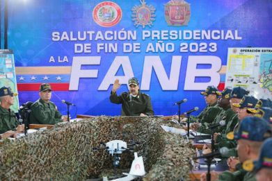 A handout picture by Venezuela's government shows President Nicolas Maduro (C) delivering a speech in Caracas before members of the country's armed forces on December 28, 2023