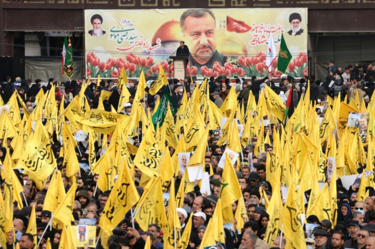 Mourners attend the funeral of Razi Moussavi, a senior commander of Iran's Islamic Revolutionary Guard Corps, who was killed in a missile strike in Syria this week