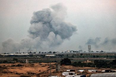 Smoke billows over the southern Gaza Strip during an Israeli bombardment on Sunday