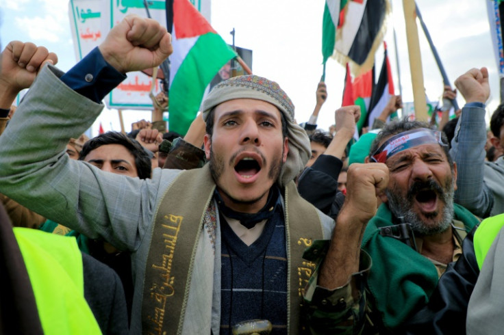 Yemeni demonstrators march through the Huthi-controlled capital Sanaa, to express solidarity with the people of Gaza, on December 29, 2023